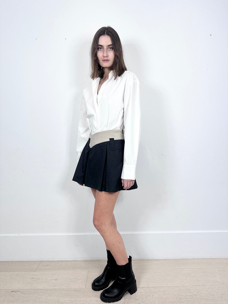 Aaizel Dipped Waist Mini Skirt